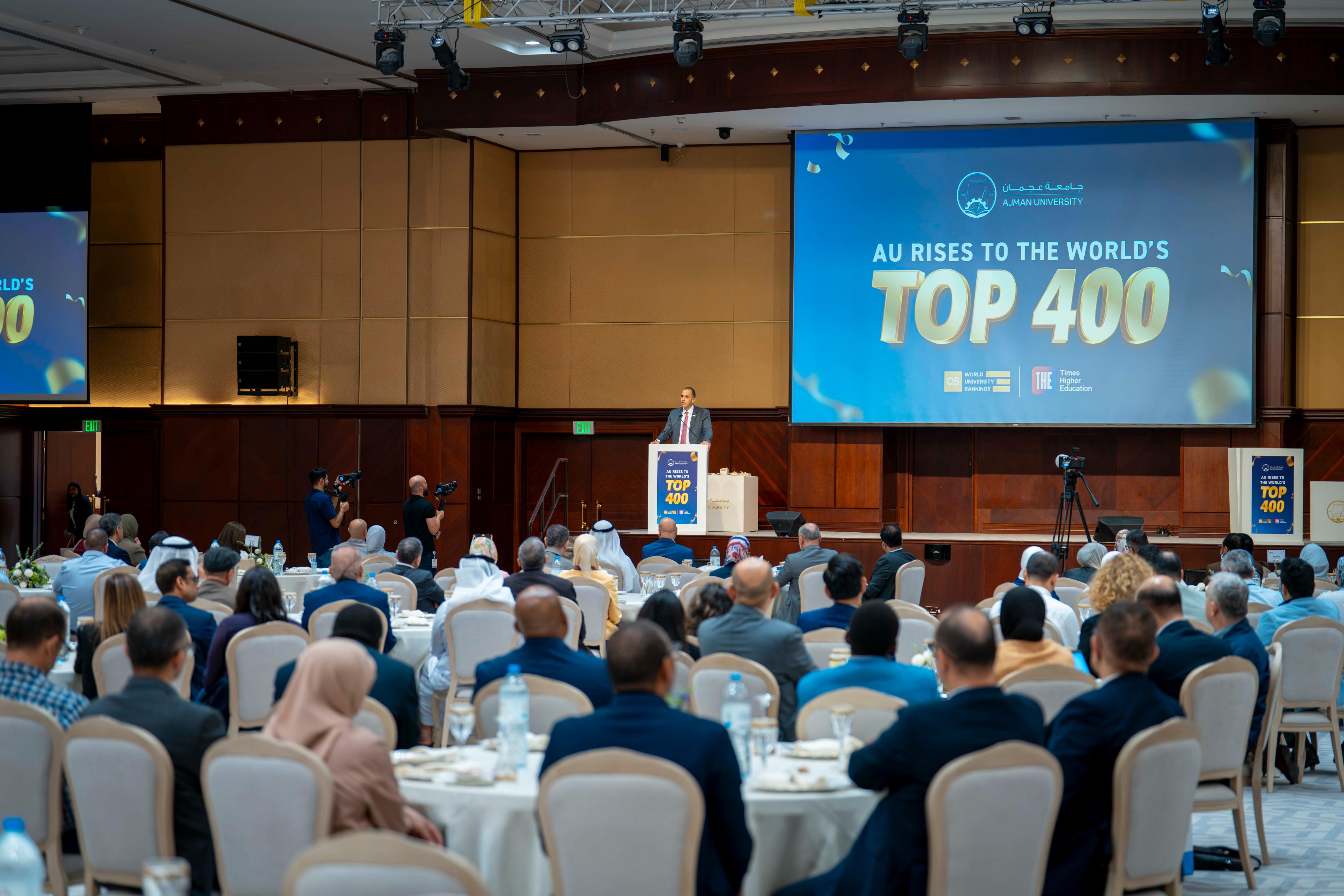 Conference with speaker, "AU Top 400."